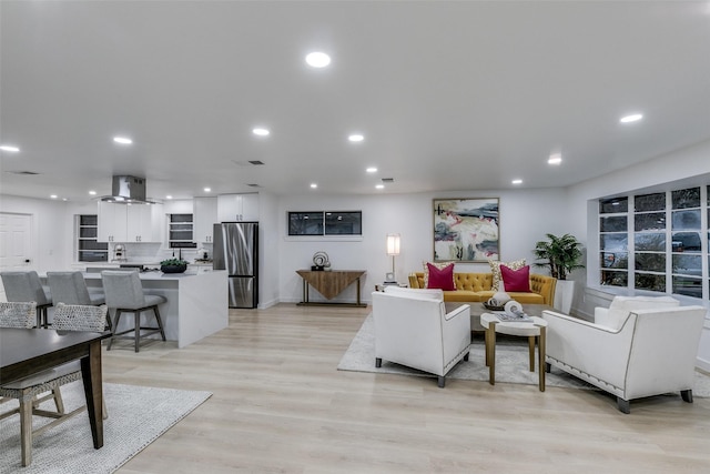 10606 Estate Ln, Dallas, TX 75238 - living area featuring recessed lighting, light wood-style floors, and baseboards
