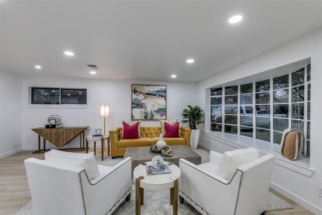10606 Estate Ln, Dallas, TX 75238 - living room with baseboards, recessed lighting, and light wood finished floors