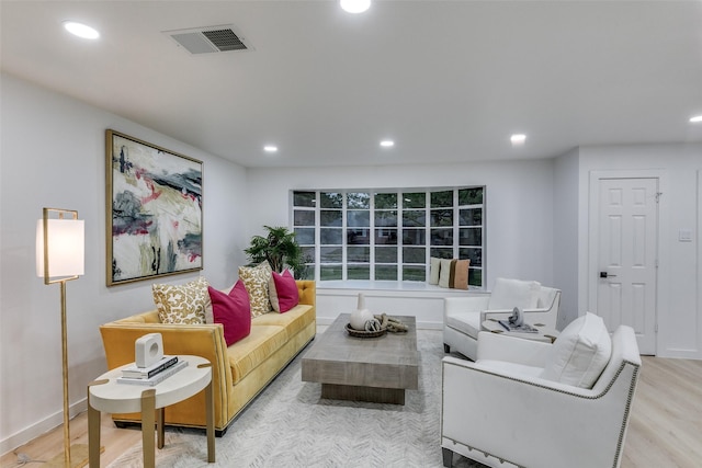 10606 Estate Ln, Dallas, TX 75238 - living area with wood finished floors, recessed lighting, and baseboards