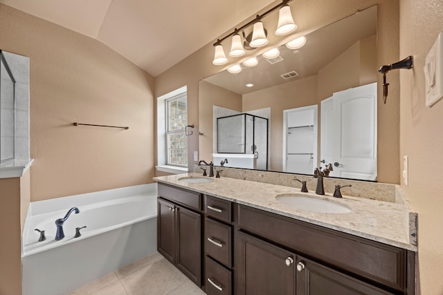 bathroom with visible vents, a sink, a garden tub, and a shower stall