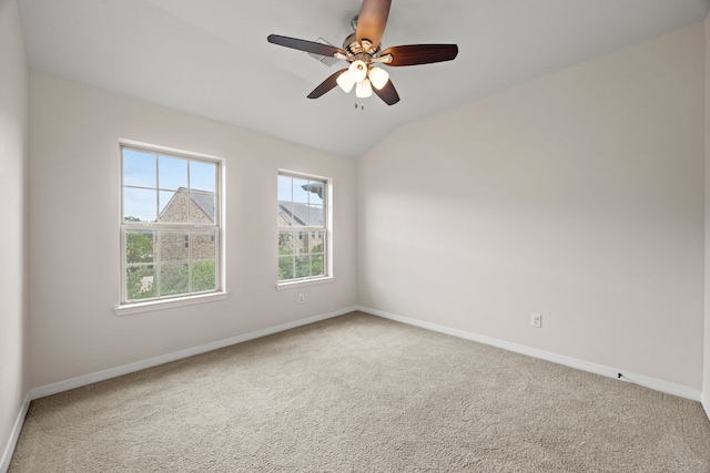 empty room with baseboards and carpet