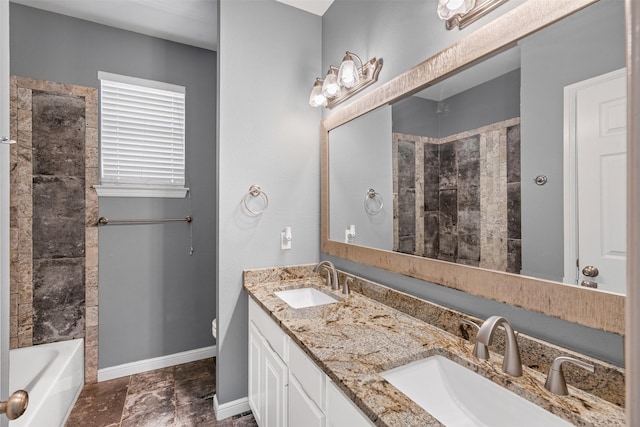 729 Ridgeway Blvd, Weatherford, TX 76086 - bathroom featuring double vanity, baseboards, and toilet
