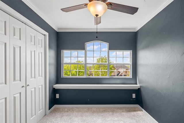 729 Ridgeway Blvd, Weatherford, TX 76086 - unfurnished bedroom featuring carpet, a closet, ornamental molding, a ceiling fan, and baseboards