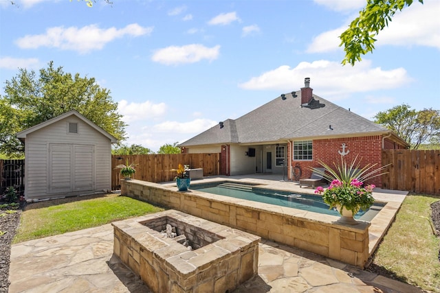 729 Ridgeway Blvd, Weatherford, TX 76086 - fenced backyard with an outdoor fire pit, a patio area, and a jacuzzi