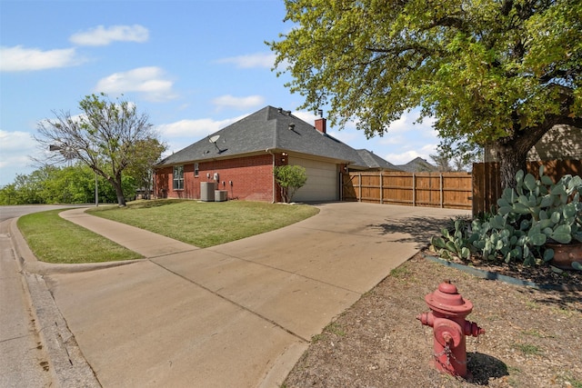 729 Ridgeway Blvd, Weatherford, TX 76086 - view of side of property featuring brick siding, a garage, a chimney, concrete driveway, and roof with shingles
