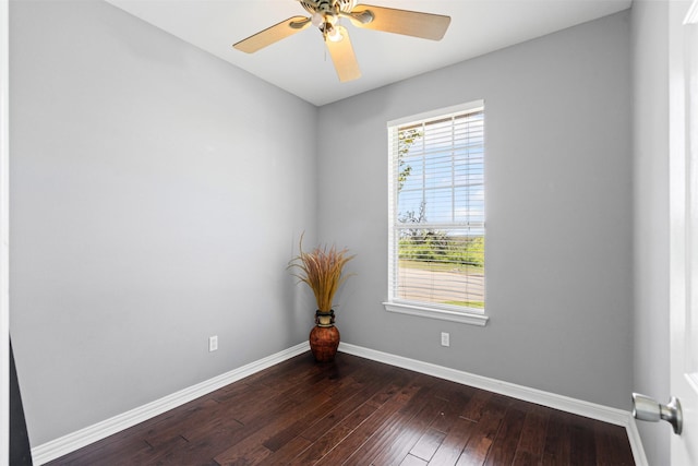 729 Ridgeway Blvd, Weatherford, TX 76086 - spare room featuring dark wood-type flooring, baseboards, and a ceiling fan