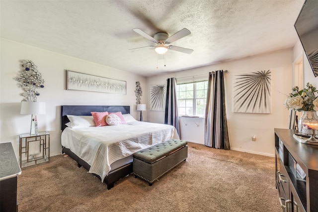 5212 Knox Dr, The Colony, TX 75056 - bedroom with ceiling fan, baseboards, a textured ceiling, and carpet floors