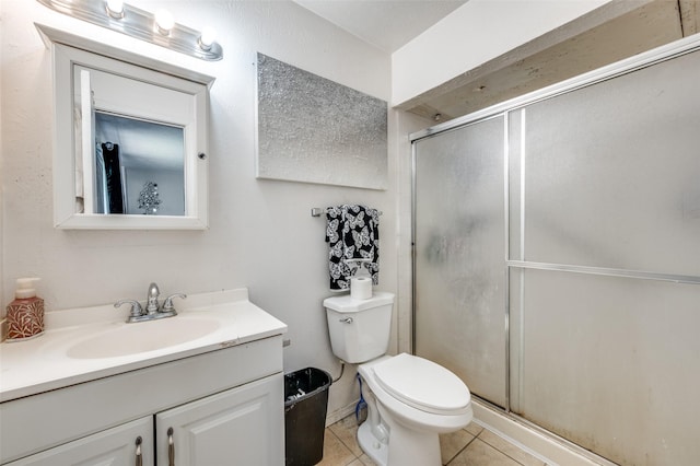 5212 Knox Dr, The Colony, TX 75056 - full bath with tile patterned floors, vanity, a stall shower, and toilet