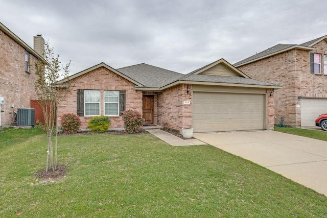 ranch-style home with driveway, roof with shingles, an attached garage, brick siding, and a front lawn