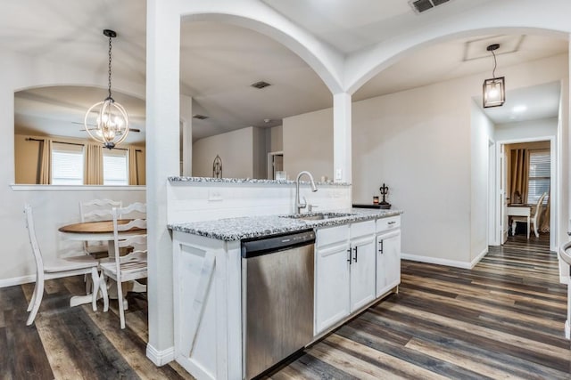 kitchen featuring a sink, a chandelier, visible vents, light stone counters, and stainless steel dishwasher