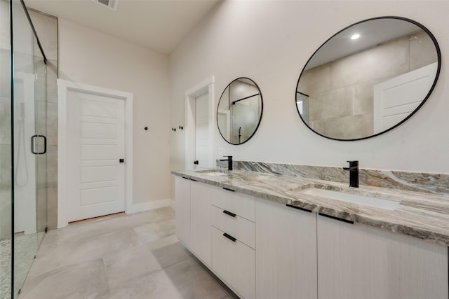 1623 Lansford Ave, Dallas, TX 75224 - full bathroom featuring baseboards, double vanity, a sink, and a stall shower