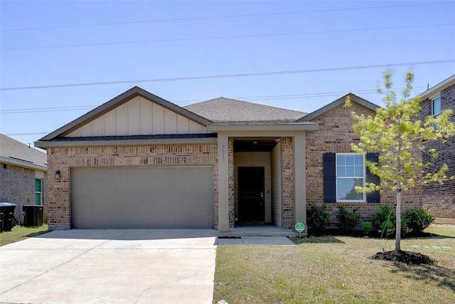 5513 Ladytown Ln, Fort Worth, TX 76036 - view of front of home featuring brick siding, driveway, a garage, central AC, and a front lawn