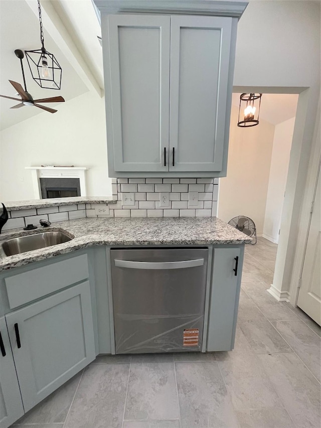 240 Wells St, Emory, TX 75440 - kitchen with dishwasher, ceiling fan, a sink, gray cabinets, and light stone counters