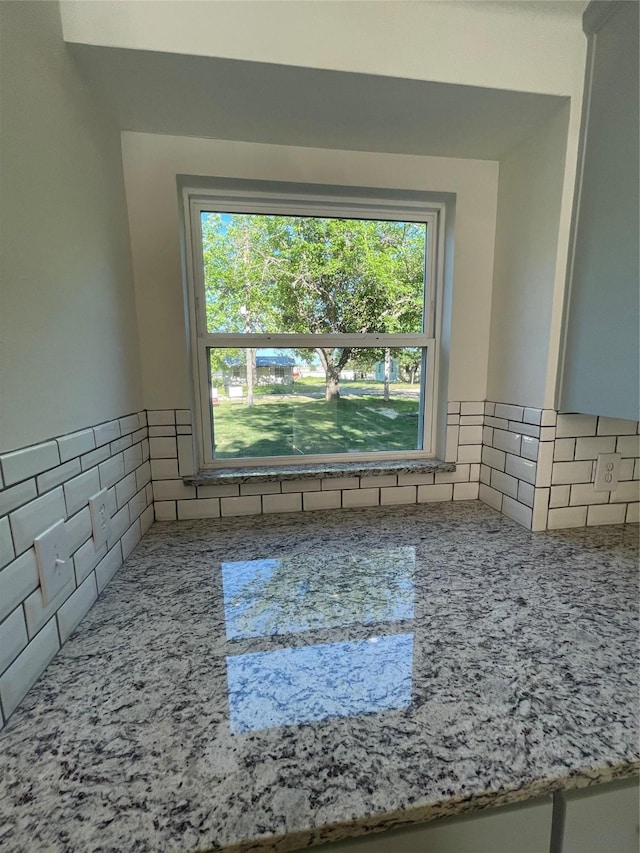 240 Wells St, Emory, TX 75440 - kitchen view of backsplash and light stone countertops