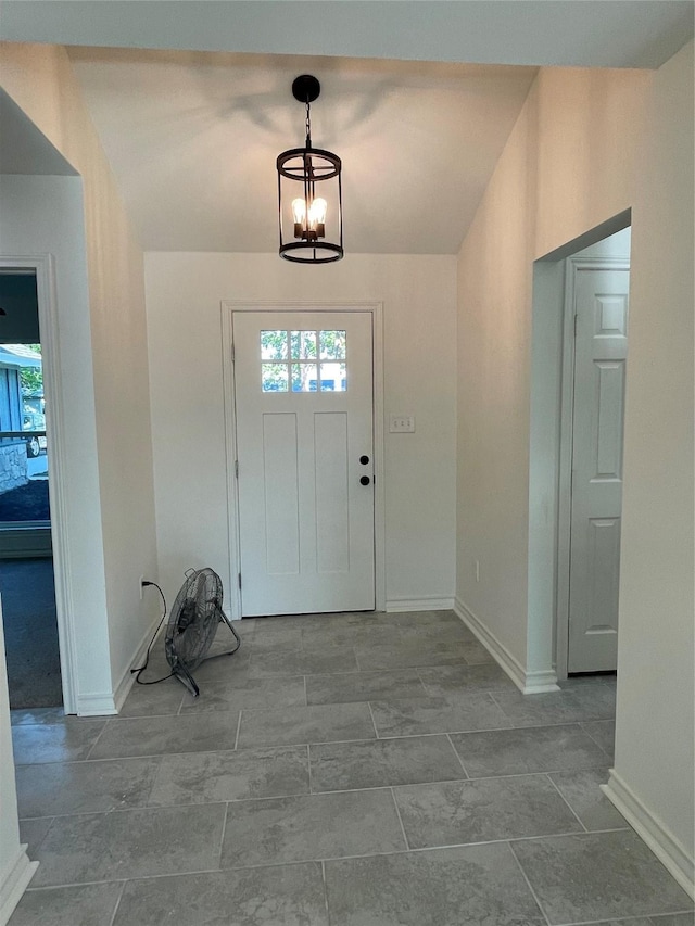 240 Wells St, Emory, TX 75440 - foyer entrance featuring baseboards and a chandelier
