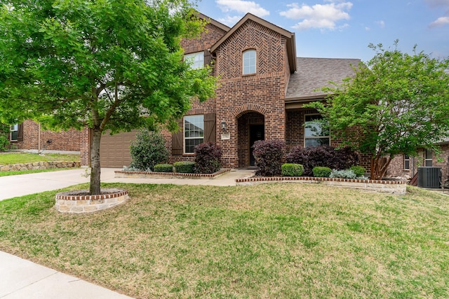 traditional-style home with central air condition unit, concrete driveway, a front lawn, and brick siding