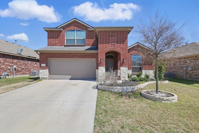 9100 Pearfield Rd, Fort Worth, TX 76179 - traditional home featuring driveway, a front yard, stone siding, an attached garage, and brick siding