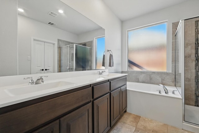 9100 Pearfield Rd, Fort Worth, TX 76179 - full bath with a shower stall, visible vents, a sink, and a healthy amount of sunlight