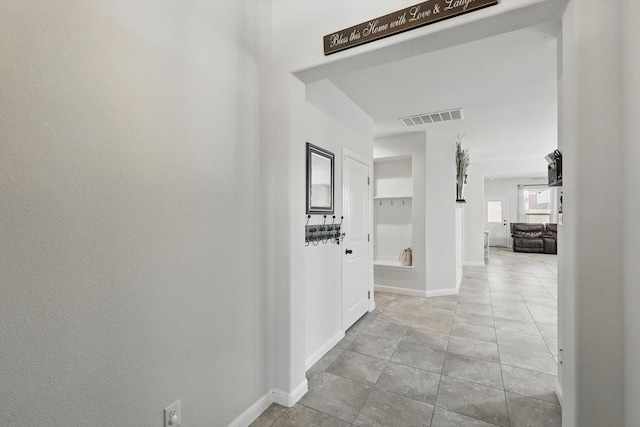 9100 Pearfield Rd, Fort Worth, TX 76179 - corridor featuring tile patterned flooring, baseboards, and visible vents