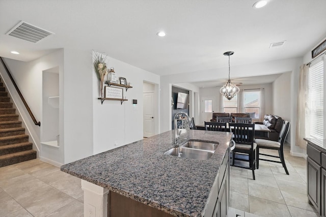 9100 Pearfield Rd, Fort Worth, TX 76179 - kitchen featuring a sink, pendant lighting, visible vents, and a chandelier