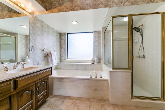 5915 Volunteer Pl, Rockwall, TX 75032 - bathroom featuring a garden tub, vanity, a stall shower, tile patterned flooring, and wallpapered walls