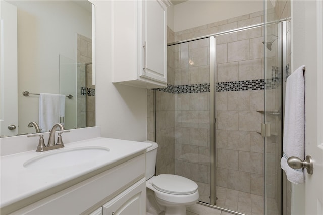 749 Lazy Brooke Dr, Rockwall, TX 75087 - bathroom featuring toilet, vanity, and a stall shower