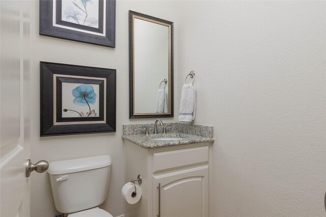 749 Lazy Brooke Dr, Rockwall, TX 75087 - half bathroom with vanity and toilet
