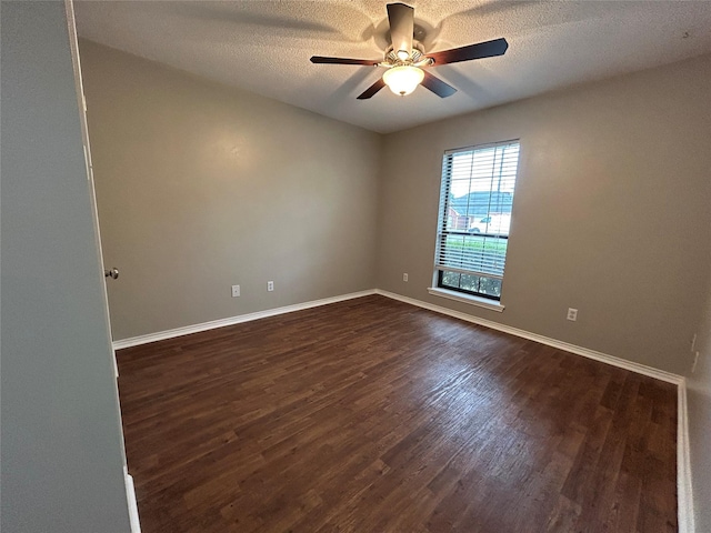 3308 Omega Dr, Tyler, TX 75701 - unfurnished room featuring a ceiling fan, dark wood-style flooring, and a textured ceiling