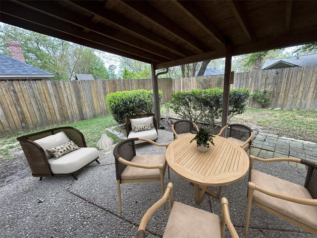 3308 Omega Dr, Tyler, TX 75701 - fenced backyard with a patio area
