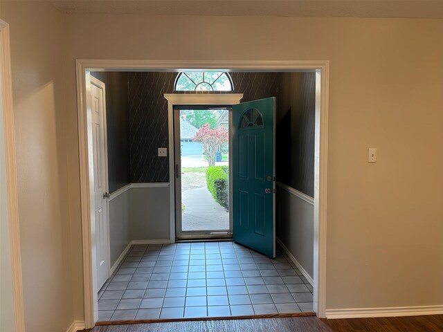 3308 Omega Dr, Tyler, TX 75701 - foyer entrance featuring baseboards and light tile patterned flooring
