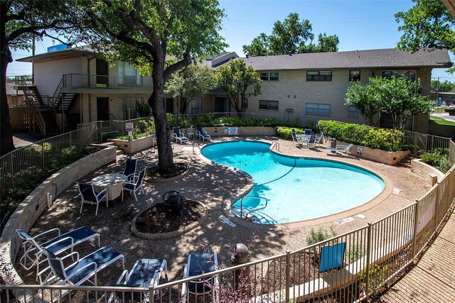 11114 Valleydale Dr Unit D, Dallas, TX 75230 - community pool with a patio area