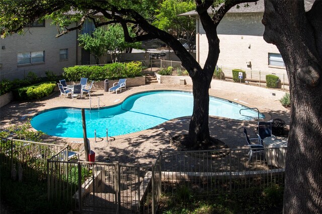 11114 Valleydale Dr Unit D, Dallas, TX 75230 - community pool featuring a patio area