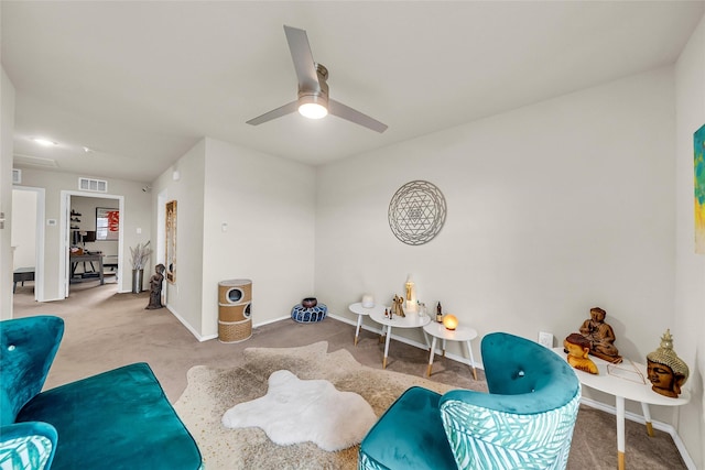 1718 Ackerly Dr, Forney, TX 75126 - living area featuring carpet floors, ceiling fan, and baseboards