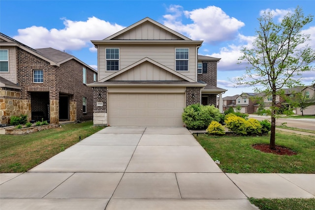 1718 Ackerly Dr, Forney, TX 75126 - view of front of house featuring board and batten siding, a front lawn, concrete driveway, and an attached garage