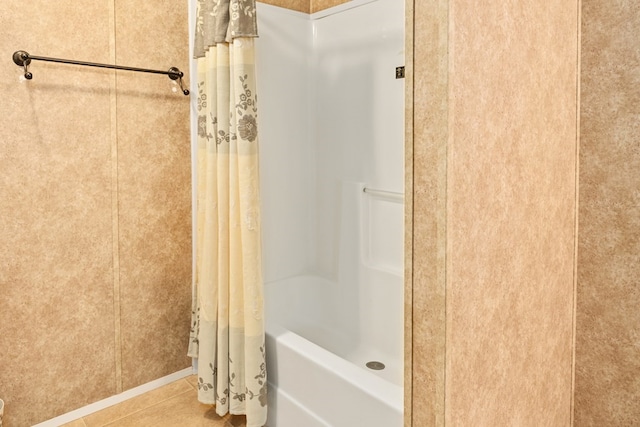 full bath featuring tile patterned floors and curtained shower