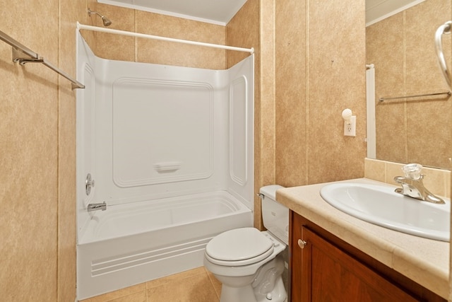 bathroom with toilet, vanity, tile patterned floors, and tub / shower combination