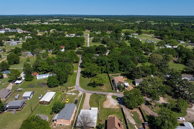 bird's eye view featuring a forest view
