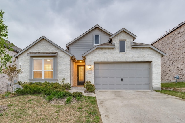 view of front of house with driveway and an attached garage