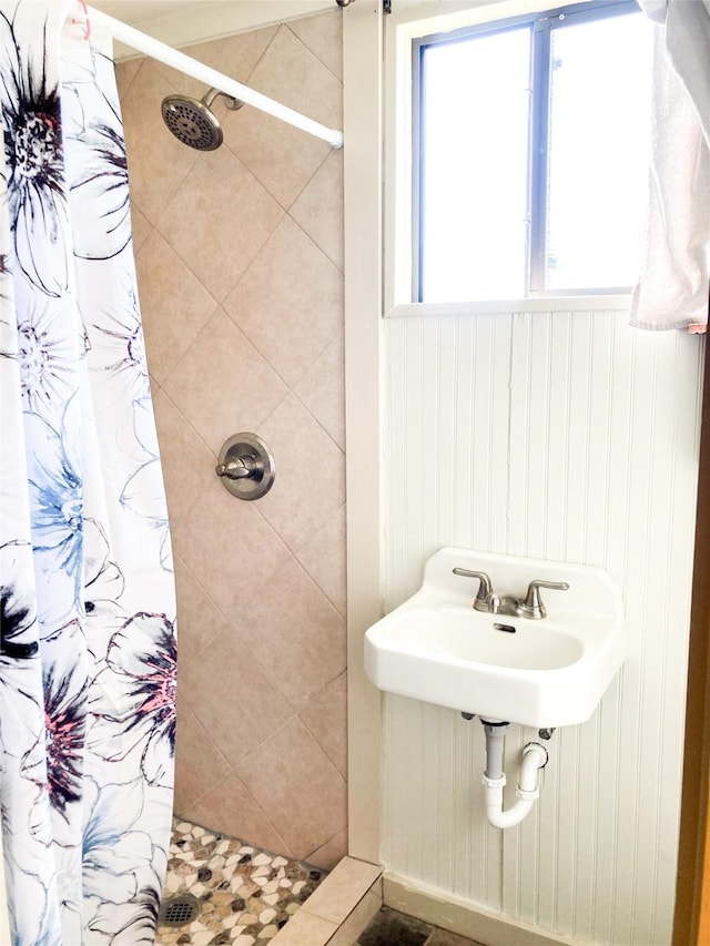 full bath featuring a shower stall
