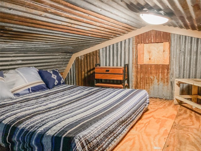 bedroom featuring vaulted ceiling