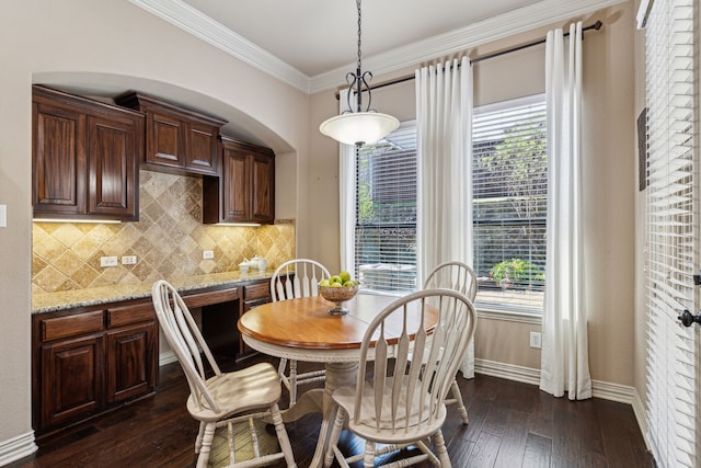 4513 Cherokee Dr, Mckinney, TX 75072 - dining room featuring ornamental molding, baseboards, plenty of natural light, and dark wood finished floors