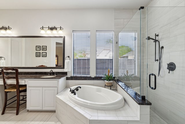 4513 Cherokee Dr, Mckinney, TX 75072 - bathroom with a shower stall, vanity, and a bath