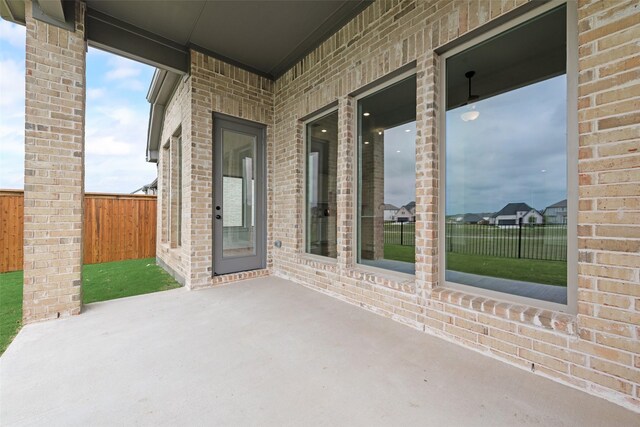 view of patio with fence