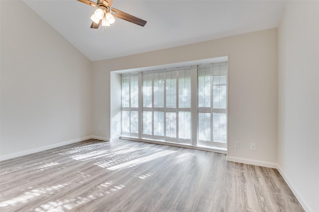 4539 N O Connor Rd Unit 2233, Irving, TX 75062 - spare room with wood finished floors, ceiling fan, baseboards, and lofted ceiling