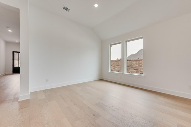 1151 Nora Ln, Forney, TX 75126 - unfurnished room featuring plenty of natural light, light wood-style flooring, lofted ceiling, baseboards, and recessed lighting