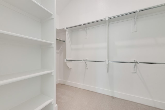 1151 Nora Ln, Forney, TX 75126 - walk in closet featuring light carpet