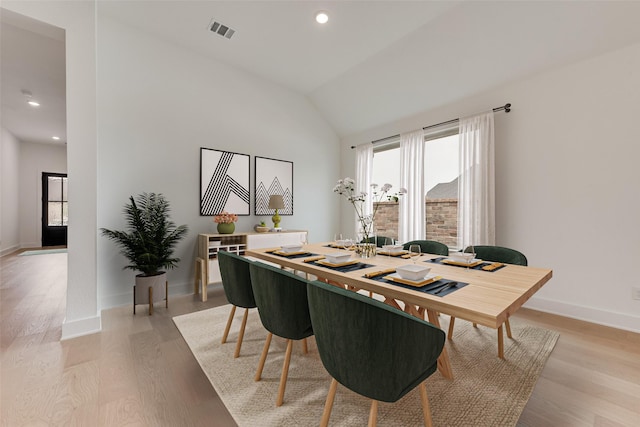 1151 Nora Ln, Forney, TX 75126 - dining room with light wood-style floors, lofted ceiling, recessed lighting, and baseboards