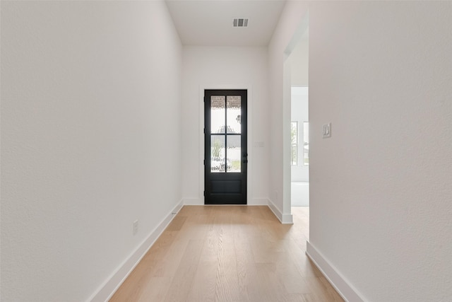 1151 Nora Ln, Forney, TX 75126 - doorway to outside with light wood-style floors and baseboards