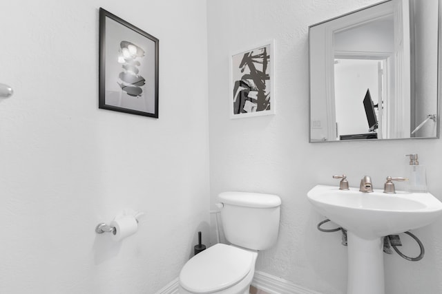 1891 Mustang Trl, Frisco, TX 75033 - half bath featuring toilet and baseboards