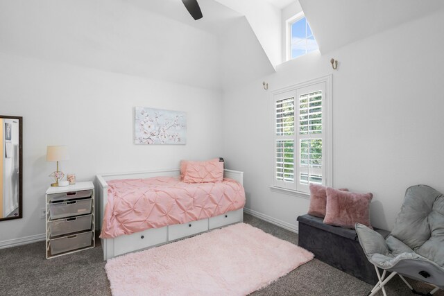 1891 Mustang Trl, Frisco, TX 75033 - bedroom with dark colored carpet, multiple windows, high vaulted ceiling, and ceiling fan